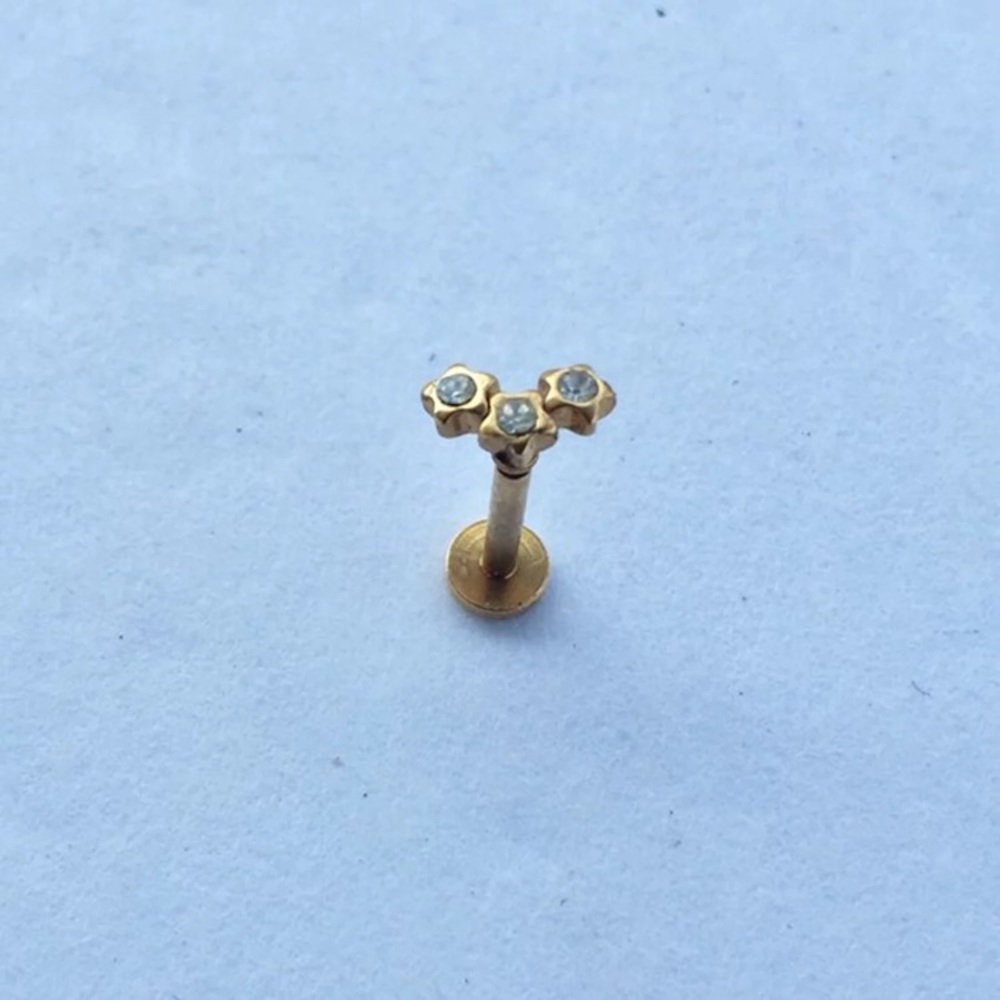 Star Tragus helix conch cartilage piercing - Picture 2 of 3